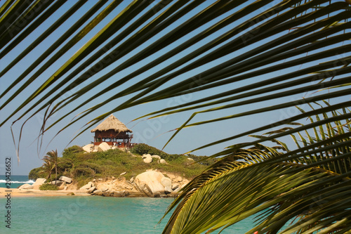 Hut with hammocks on a Caribbean beach. Tayrona National Park.