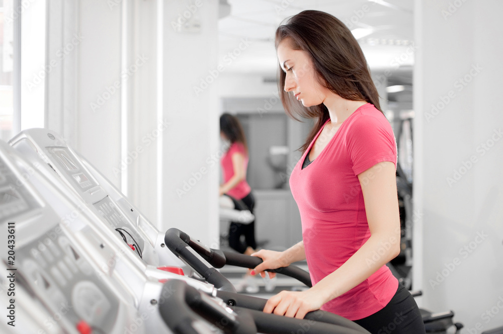 woman on a running simulator woman on a running simulator