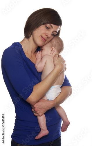 Loving mom hugging her baby