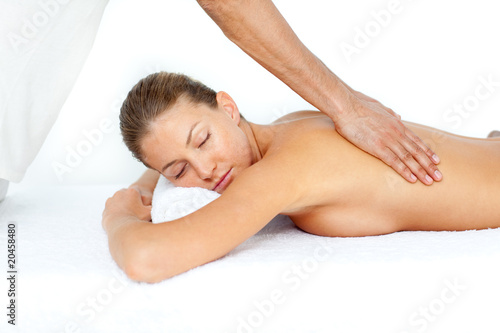 Relaxed woman having a back massage