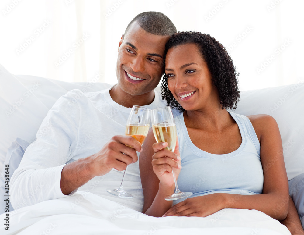 Loving couple toasting with Champagne Loving couple toasting with Champagne