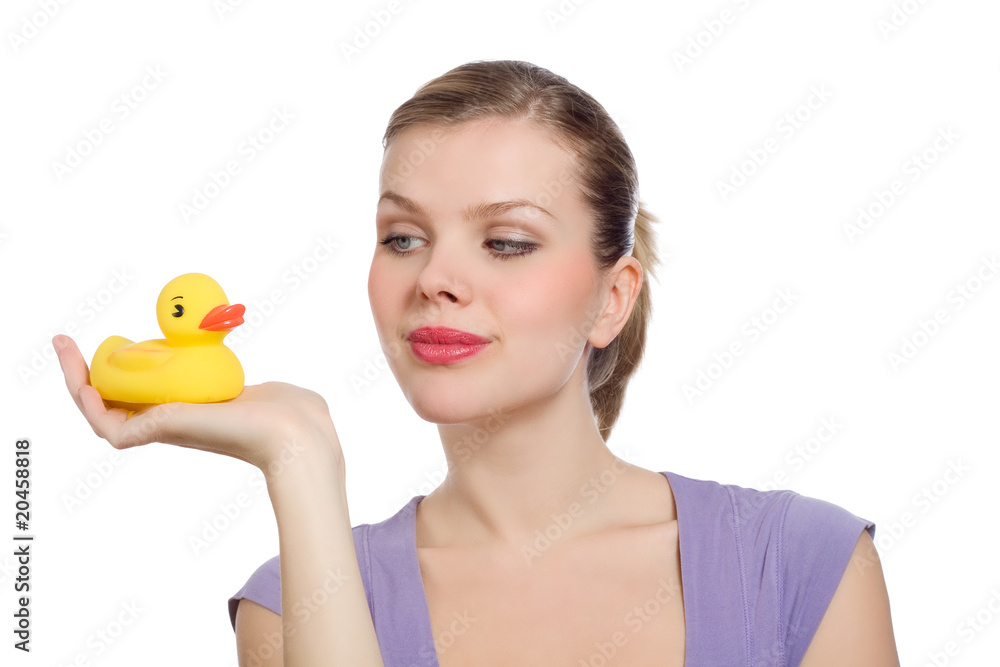 woman with a yellow rubber duck on her hand woman with a yellow rubber duck on her hand