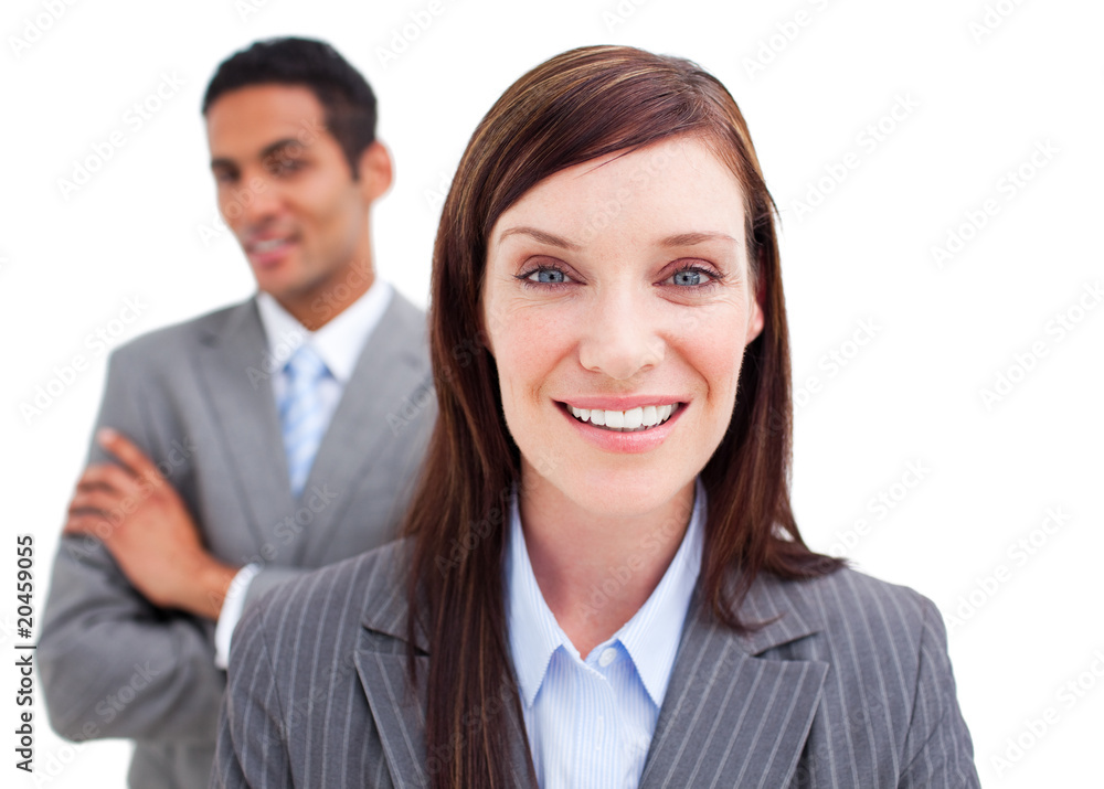 Portrait of businesswoman posing in front of her colleague Portrait of businesswoman posing in front of her colleague