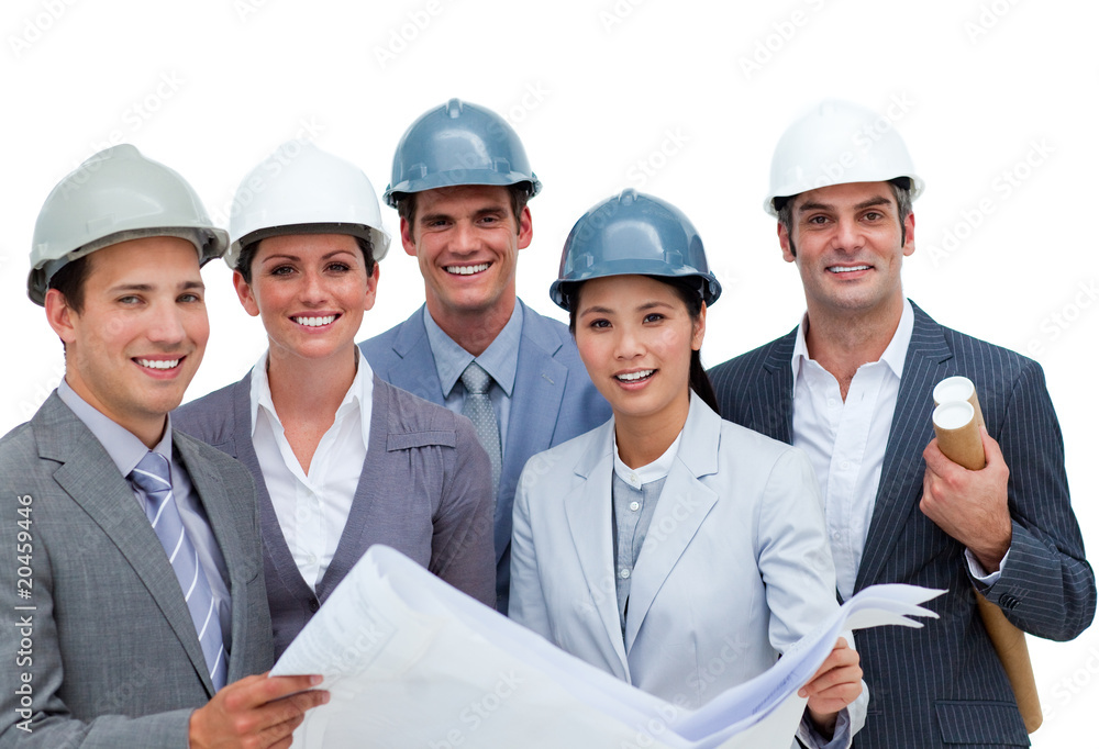 International architects studying blueprints International architects studying blueprints