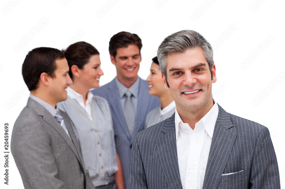 Mature manager standing with his team Mature manager standing with his team