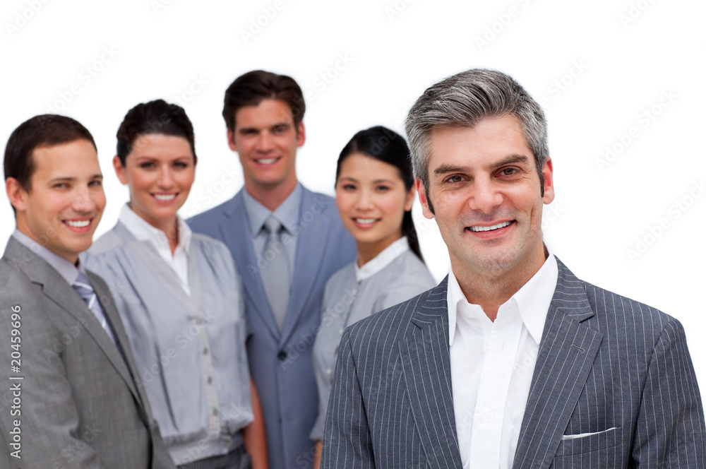 Smiling manager standing with his team Smiling manager standing with his team