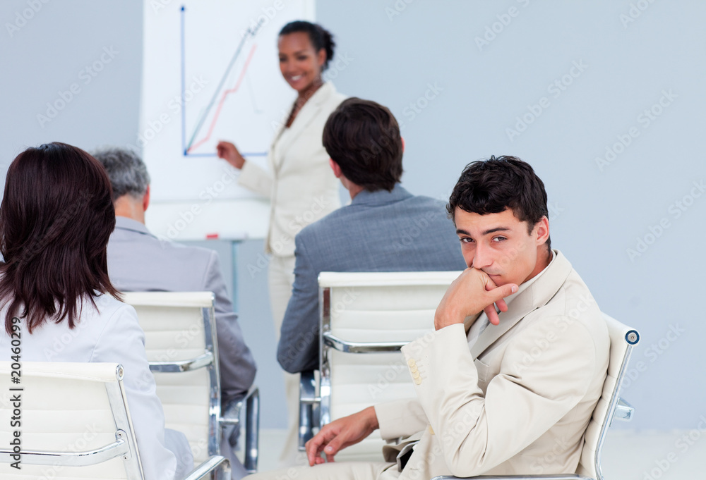 Bored businessman at a conference Bored businessman at a conference