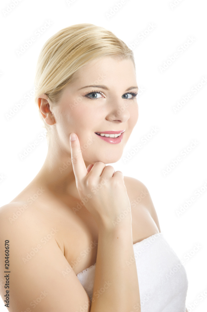 Young beautiful woman with healthy skin in white towel Young beautiful woman with healthy skin in white towel