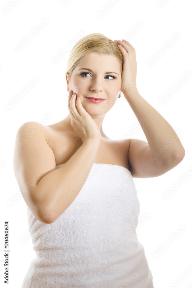 Young beautiful woman with healthy skin in white towel Young beautiful woman with healthy skin in white towel