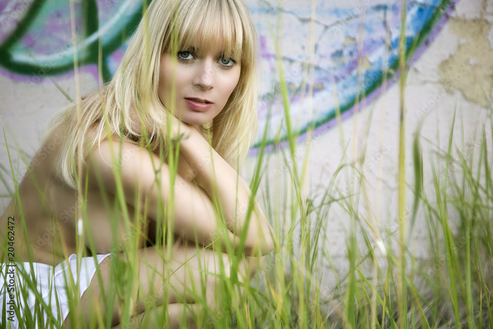 blonde nude girl sitting behind grass blonde nude girl sitting behind grass