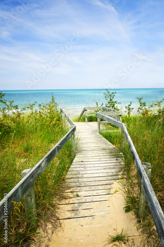 Wooden walkway over dunes at beach