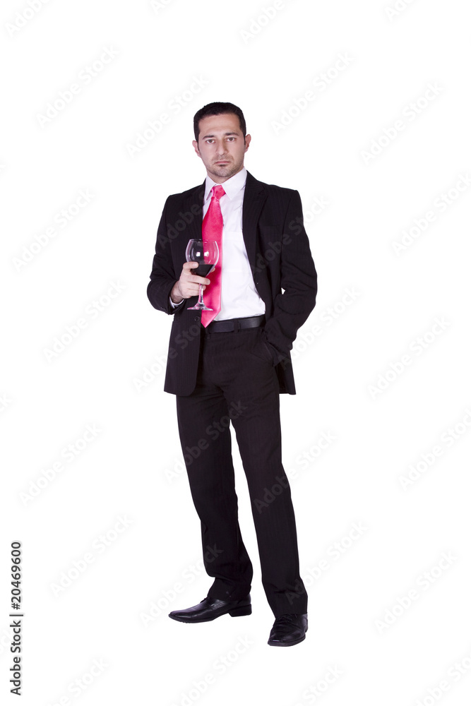 Businessman celebrating with a glass of drink Businessman celebrating with a glass of drink