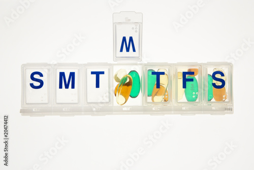 Pills in a Pill Organizer. Isolated photo