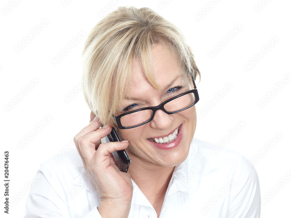 Smiling business woman with her mobile phone Smiling business woman with her mobile phone