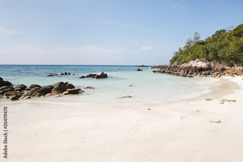 Island lagoon with white sanded beach
