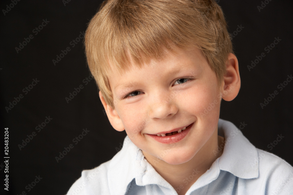 Studio Portrait Of Smiling Boy Studio Portrait Of Smiling Boy