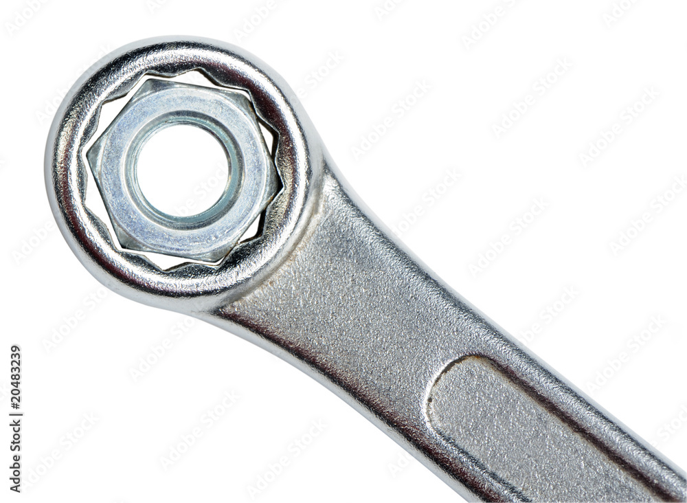 Wrench with a nut Wrench with a nut