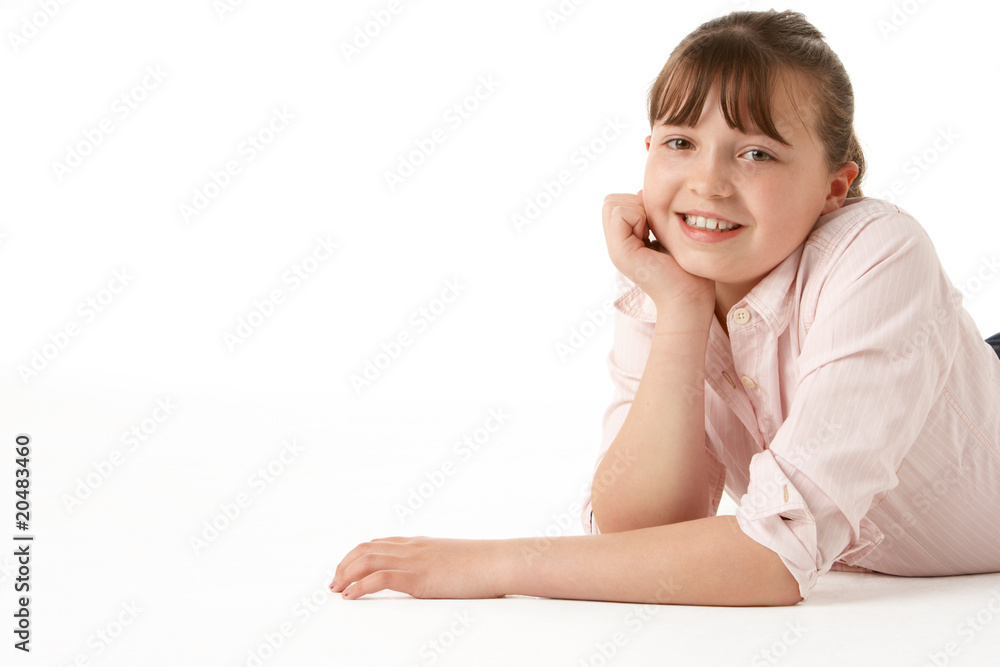 Young Girl Lying On Stomach In Studio Young Girl Lying On Stomach In Studio