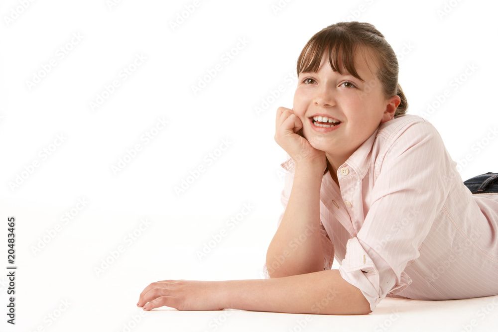 Young Girl Lying On Stomach In Studio Young Girl Lying On Stomach In Studio