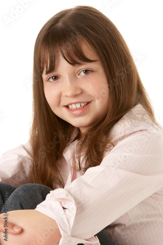 Young Girl Sitting In Studio