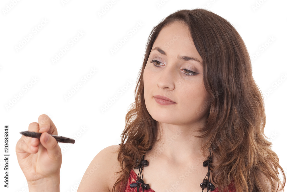 Obraz premium Young woman writing on abstract screen (glass)