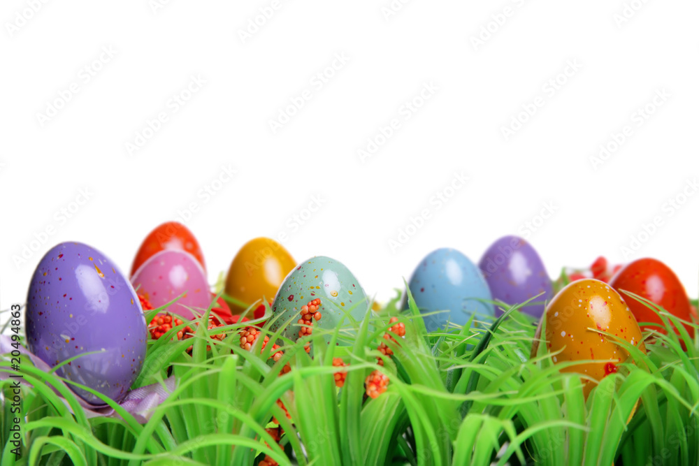 Easter Background - colorful Easter eggs on the grass.