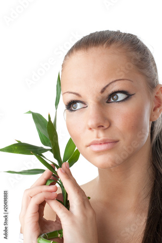 Girl with bamboo branch