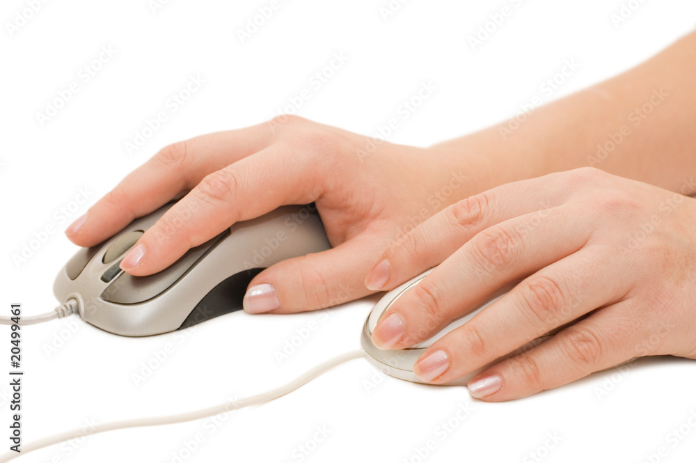 Hand with a computer mouse isolated on white Hand with a computer mouse isolated on white