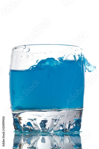 Blue liquid in a low glass