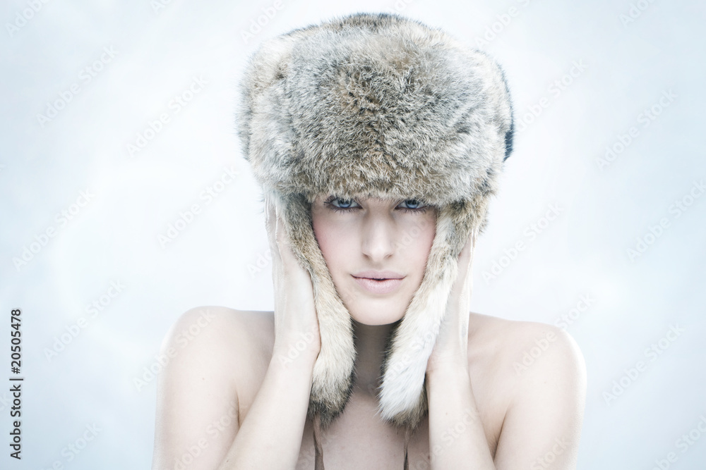 beautiful girl in a fur hat