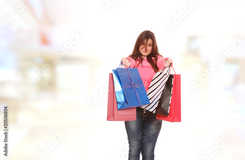 young woman smiling in the shopping mall.