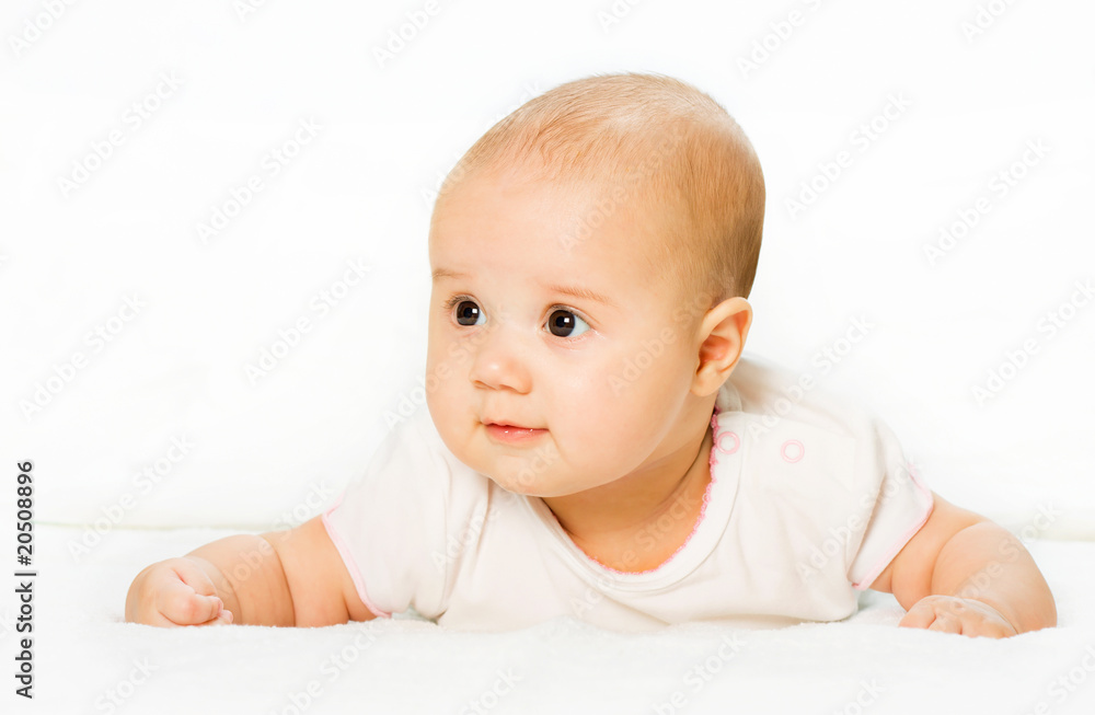 playing baby is on abdomen and white background playing baby is on abdomen and white background
