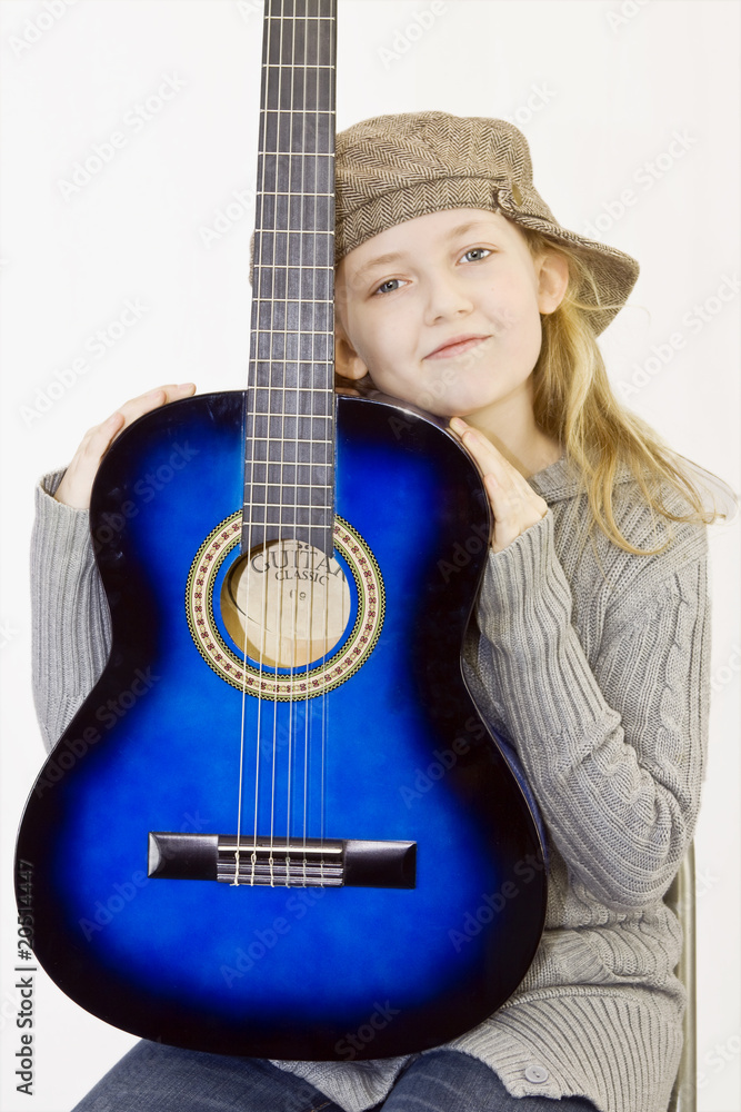Fototapeta premium Kind mit Gitarre
