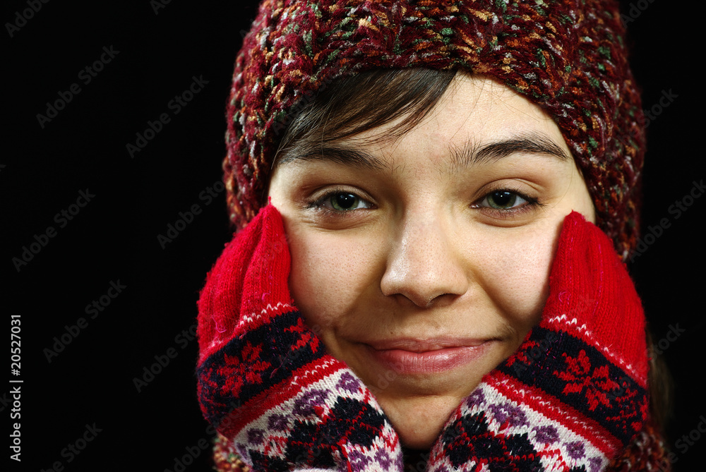 Girl in woolen mittens and hat Girl in woolen mittens and hat