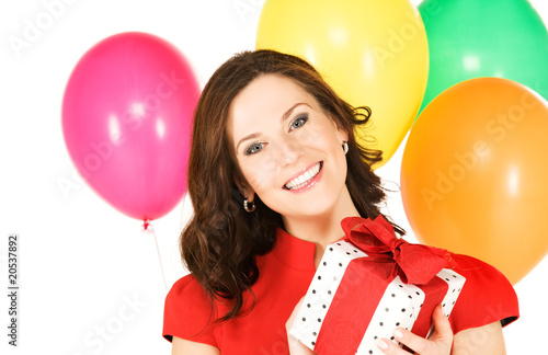 happy woman with gift box and balloons © Syda Productions