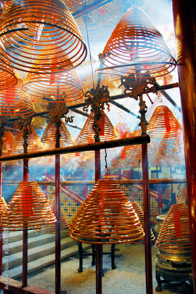 Fototapeta premium Hong Kong, sun light through incense coils in Man Mo temple