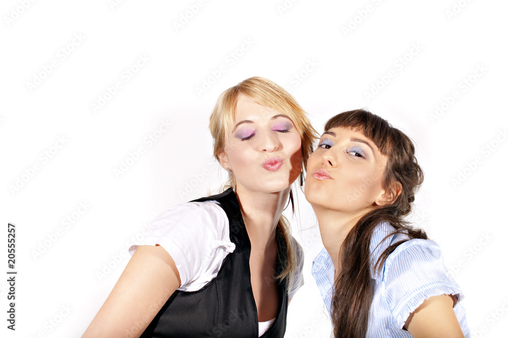 Two beautiful laughing sexy and smiling girls kissing you Stock Photo |  Adobe Stock