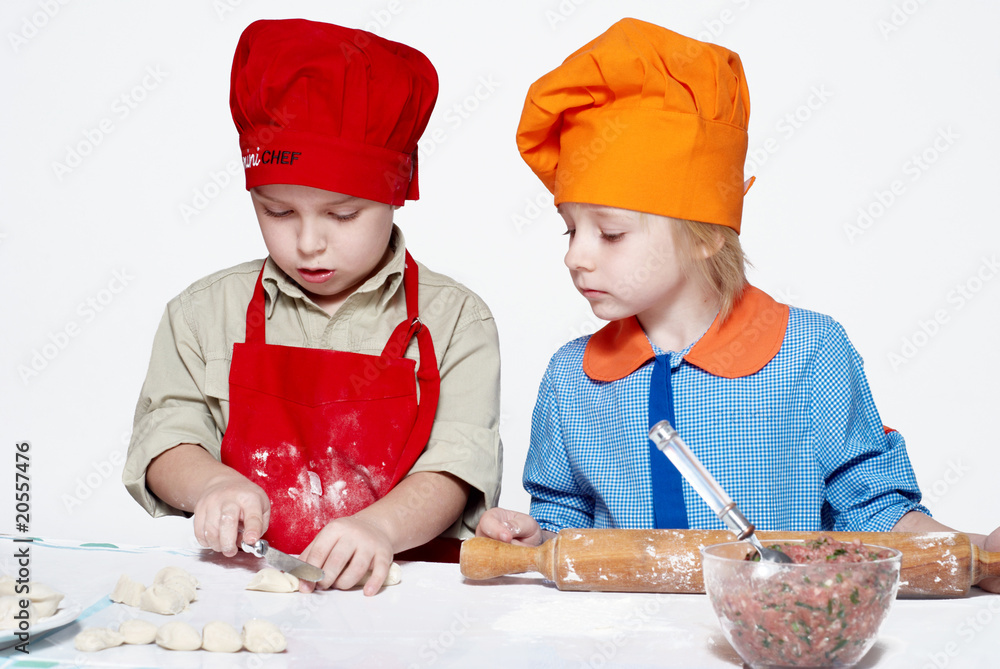 Small chefs, working with the dough Small chefs, working with the dough