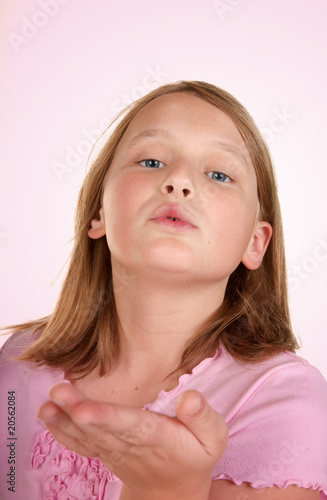 young girl blowing a kiss © clearviewstock