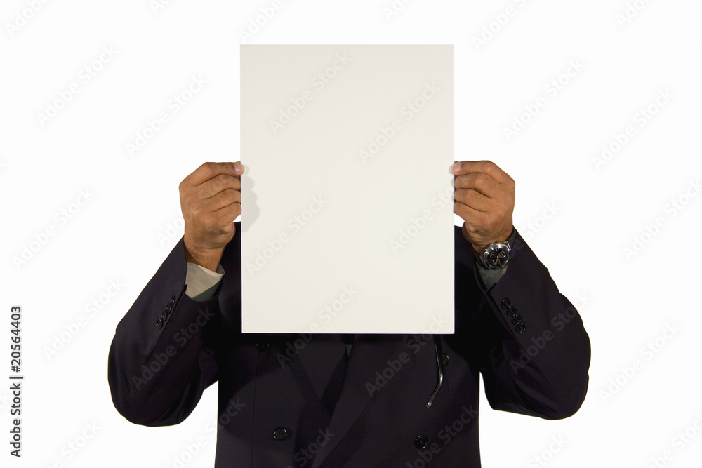 African-American businessman holding white board African-American businessman holding white board