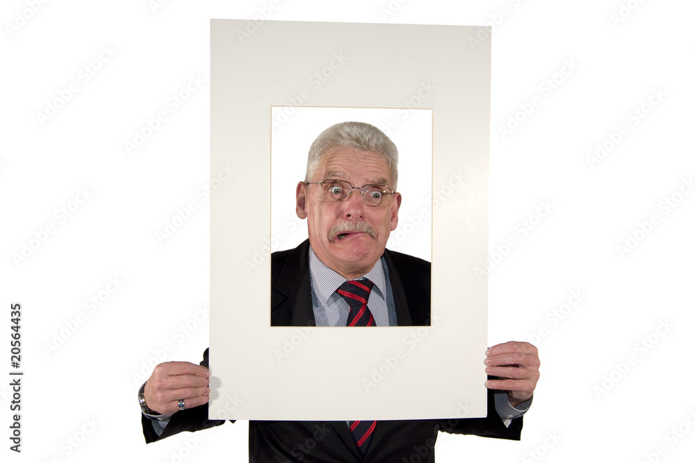 senior businessman holding passepartout and making faces senior businessman holding passepartout and making faces