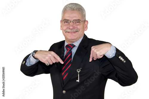 smiling senior manager pointing at a key
