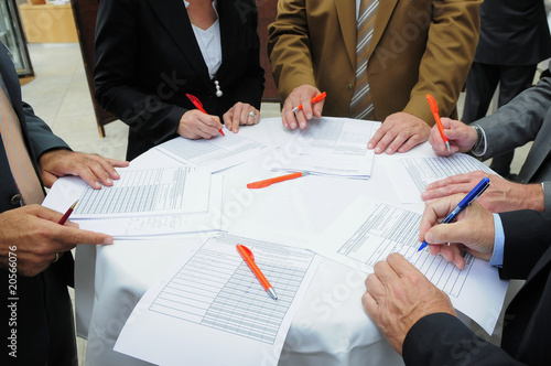 people working at a meeting