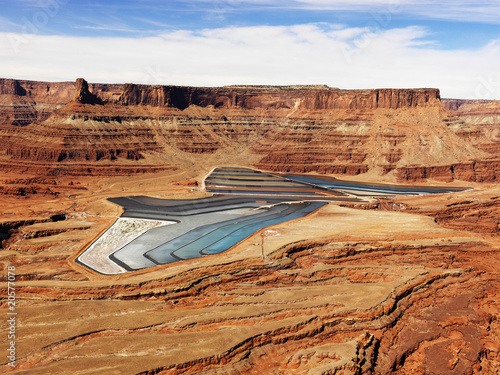 Canvas Print Tailing Ponds in Craggy Landscape