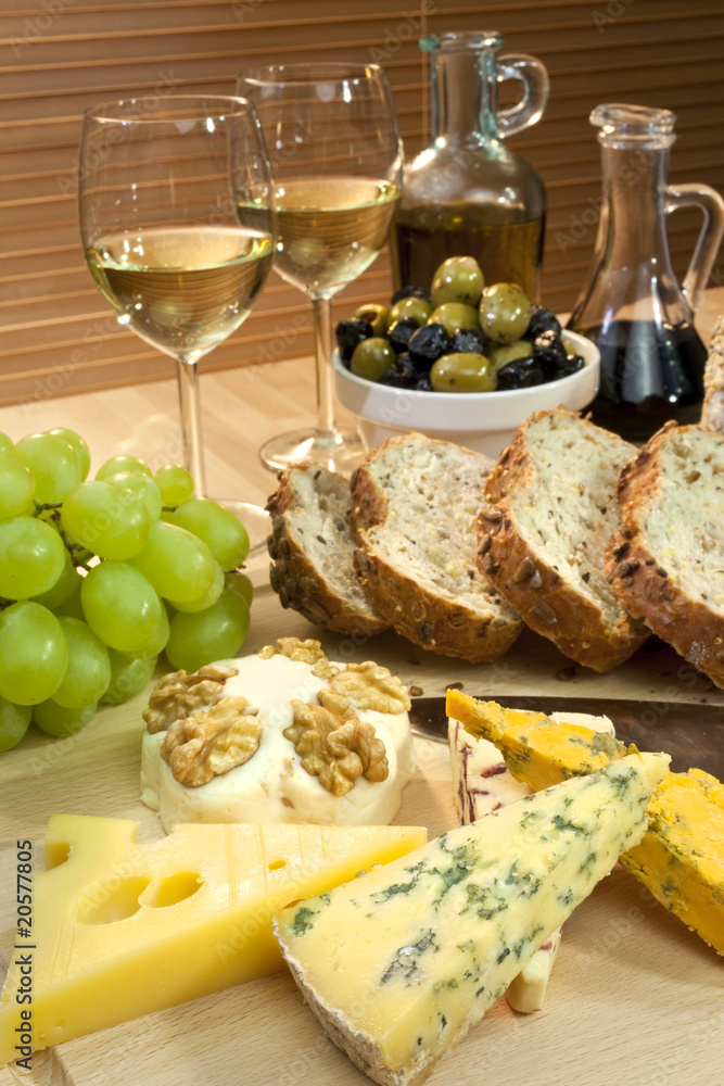 Fototapeta premium Cheese, White Wine, Grapes, Olives, Bread, Balsamic Vinegar