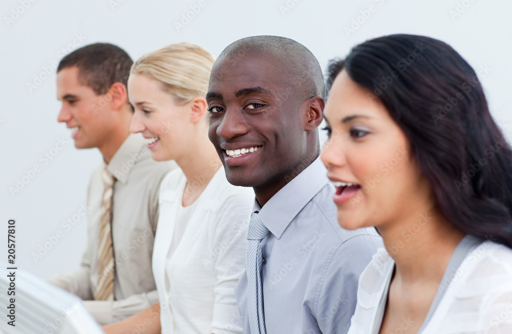 Ethnic businessman and his team at work Ethnic businessman and his team at work