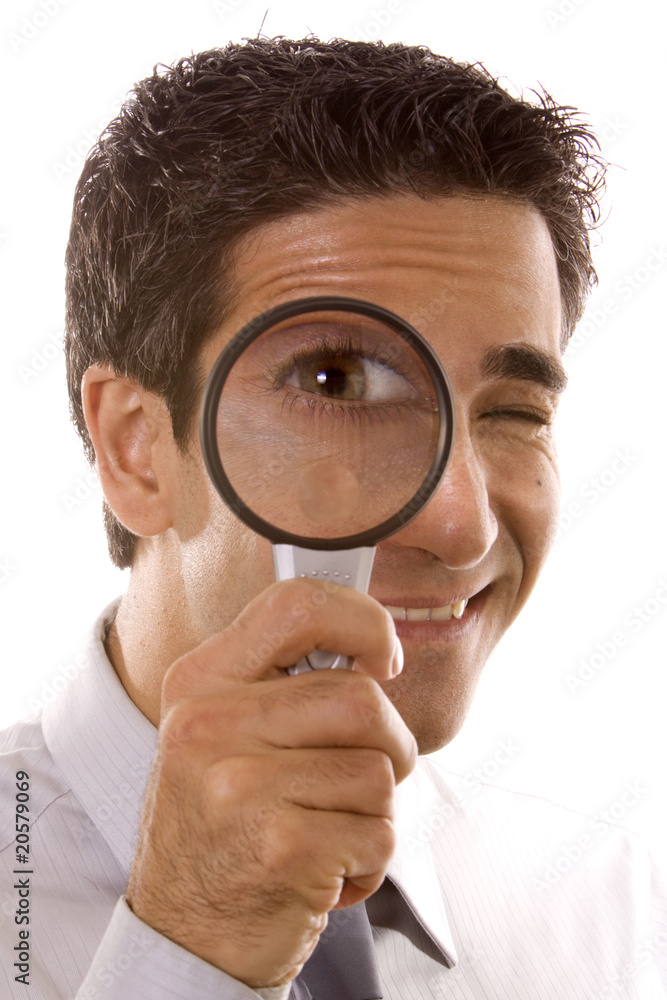 Man holding a magnifier Man holding a magnifier