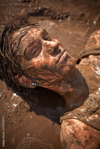 beautiful woman in the mud