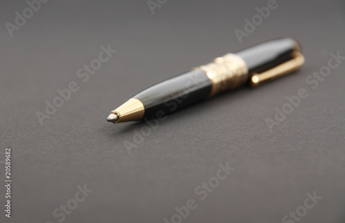 The beautiful pen on a black background