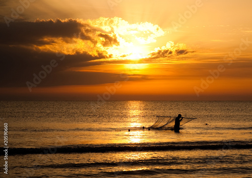 Silhouette Of Fisherman In The Sea © Kristina Afanasyeva